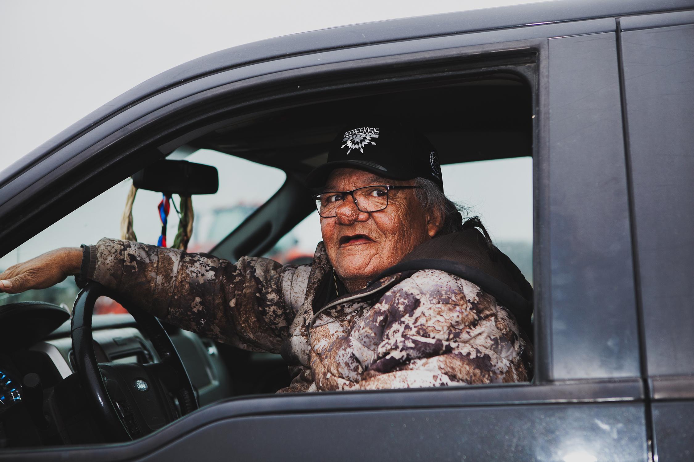Across Canada Voices are Rising - Man in truck Across Canada Voices are Rising - Man in truck